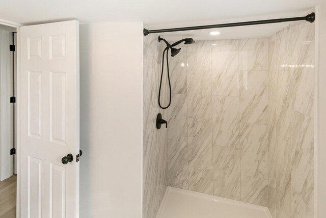 full bathroom with a shower stall