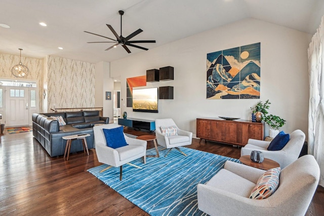 living area featuring recessed lighting, dark wood-type flooring, ceiling fan, and vaulted ceiling