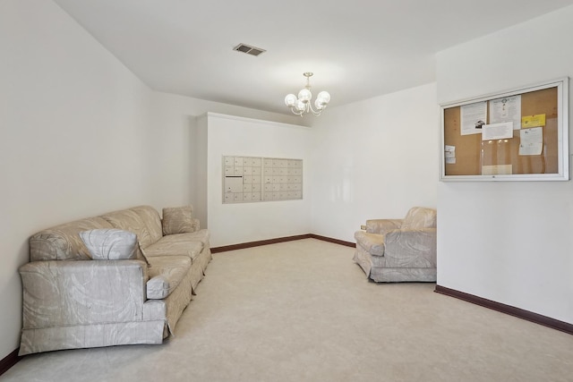 sitting room featuring visible vents, baseboards, mail area, and carpet flooring