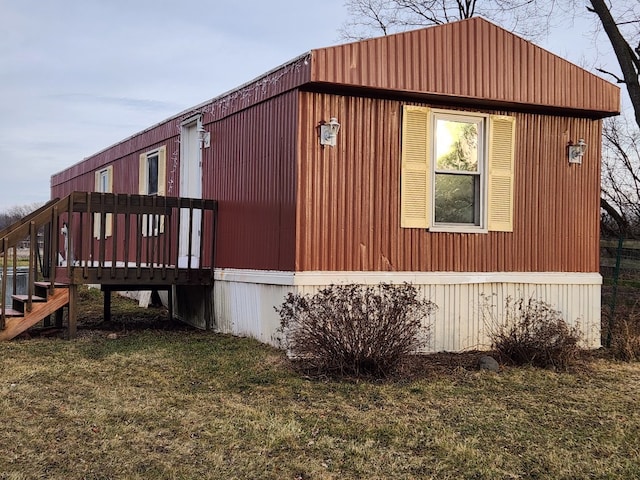 view of property exterior featuring a yard