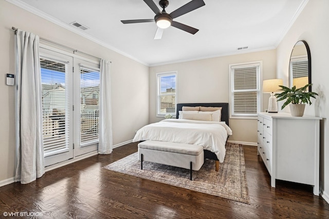 bedroom with access to exterior, visible vents, crown molding, and wood finished floors