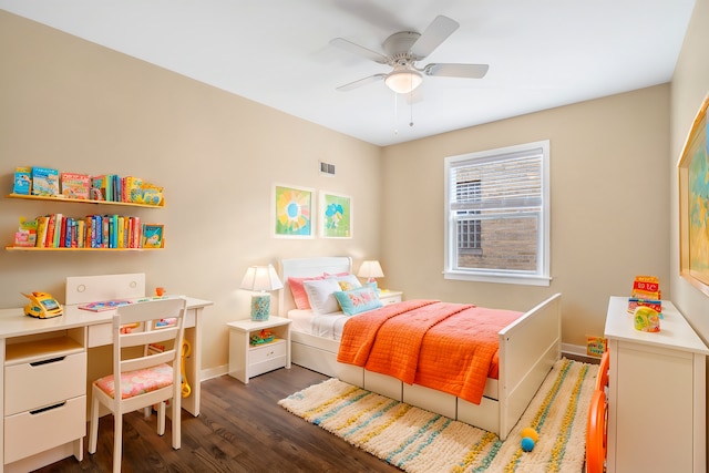 bedroom with a ceiling fan, visible vents, dark wood finished floors, and baseboards