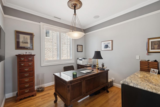 home office with visible vents, light wood-style flooring, and baseboards