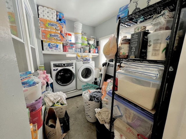 laundry area with laundry area and independent washer and dryer