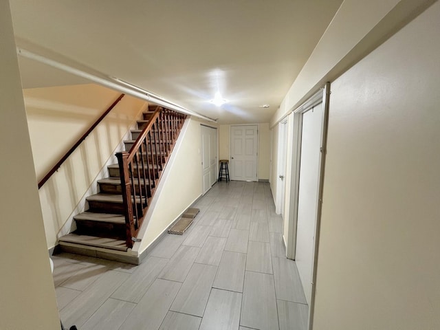 interior space featuring stairs and wood finish floors