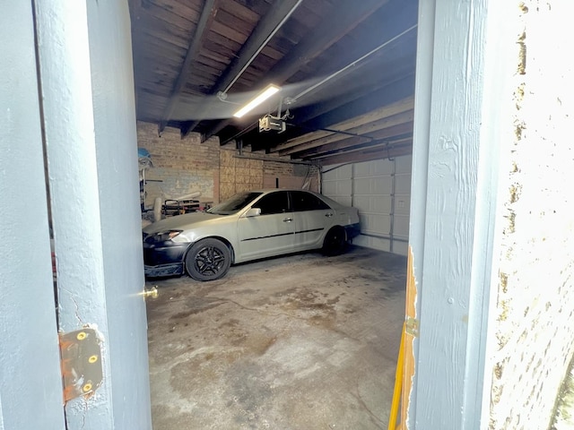 garage featuring a garage door opener