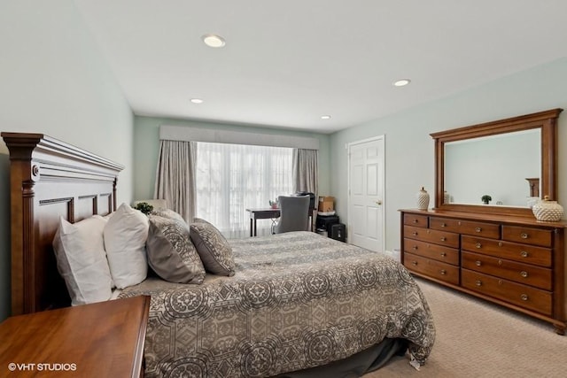 carpeted bedroom with recessed lighting