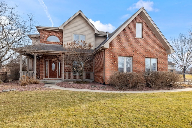 traditional home with covered porch, a front lawn, and brick siding