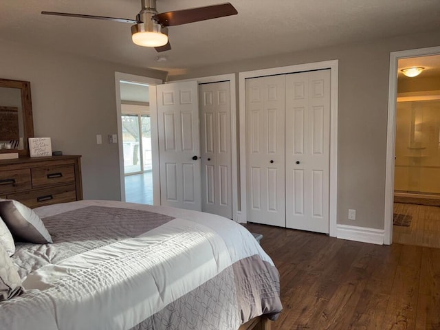 5-124 Sunrise Ct, Lanark, IL 61046 - bedroom with dark wood-style floors, ceiling fan, baseboards, and two closets