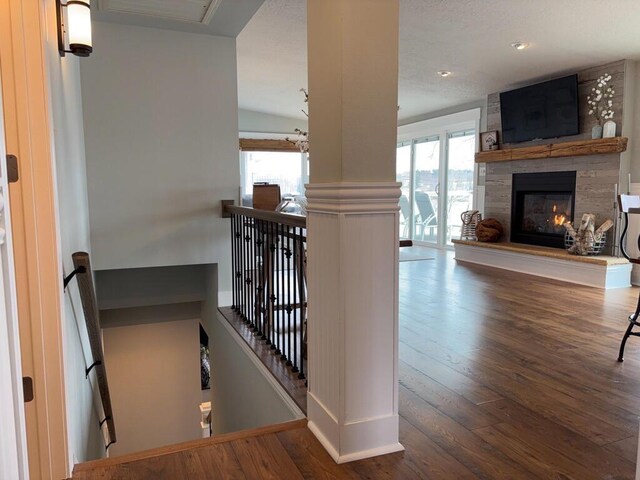 5-124 Sunrise Ct, Lanark, IL 61046 - interior space featuring wood-type flooring, an upstairs landing, and baseboards