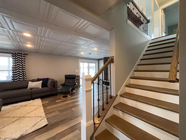 5-124 Sunrise Ct, Lanark, IL 61046 - stairs with an ornate ceiling, recessed lighting, and wood finished floors