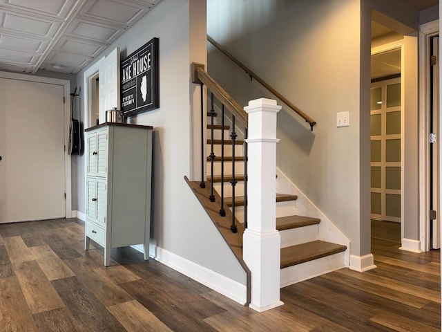 5-124 Sunrise Ct, Lanark, IL 61046 - stairs featuring baseboards and wood finished floors