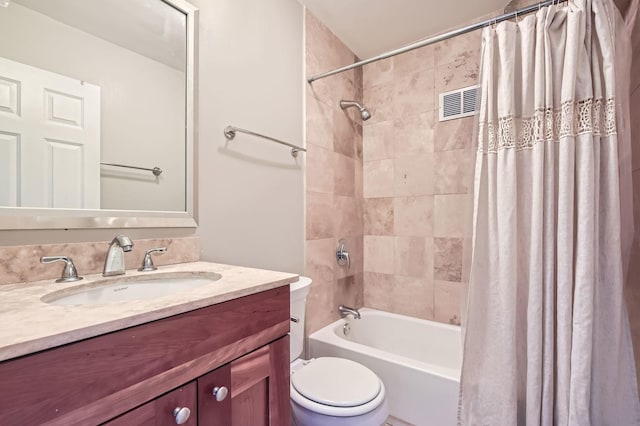 full bath featuring visible vents, toilet, shower / bath combo, and vanity