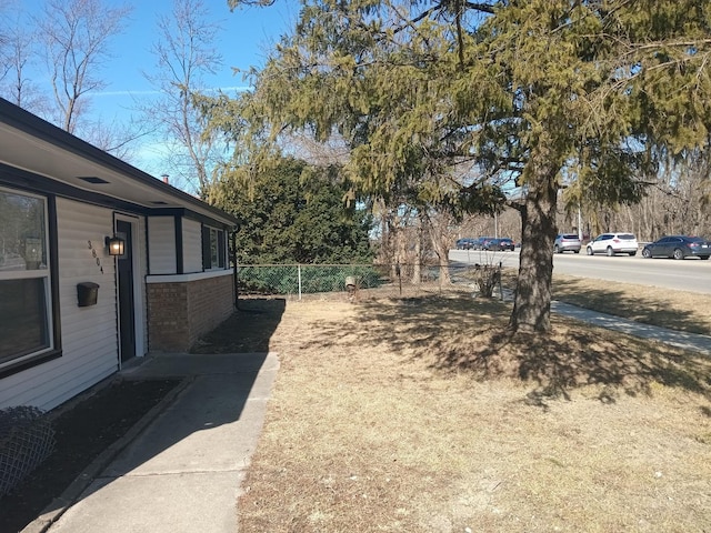 view of yard with fence