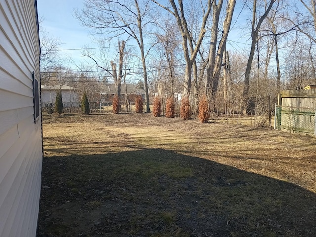 view of yard with fence