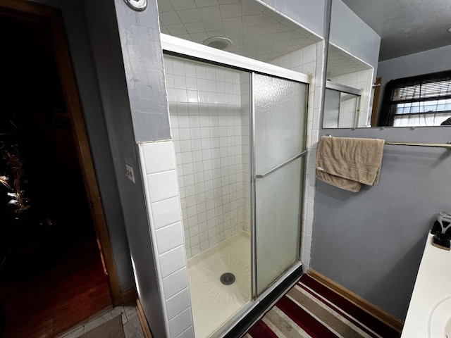 bathroom with a stall shower