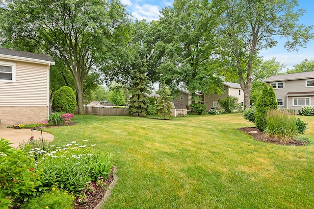 view of yard featuring fence