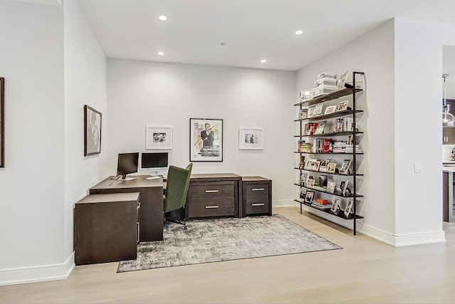 office with recessed lighting, baseboards, and light wood-style floors