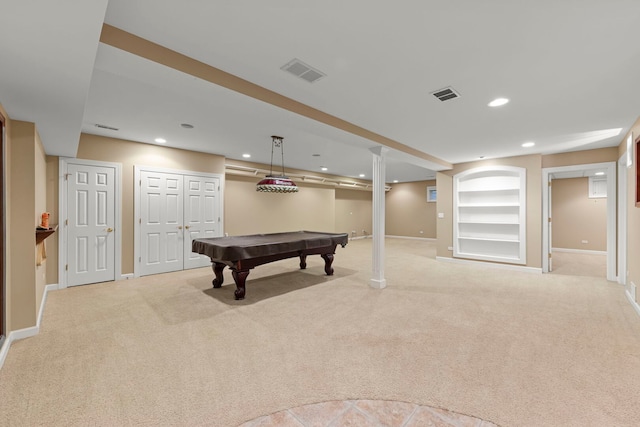 recreation room with carpet floors, visible vents, built in features, and recessed lighting