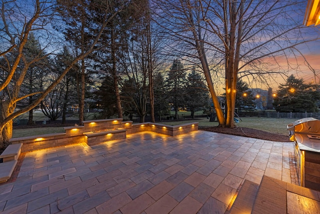 patio terrace at dusk with fence