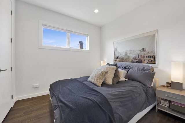 bedroom featuring recessed lighting, wood finished floors, and baseboards