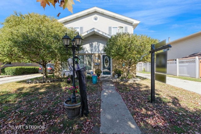 view of front of property with fence