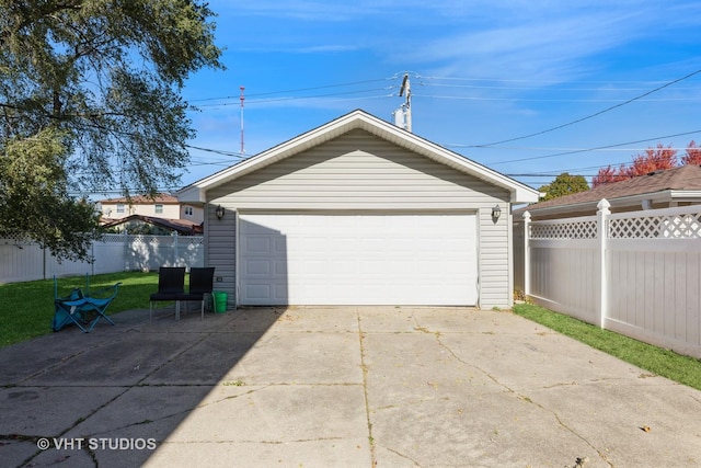 detached garage with fence