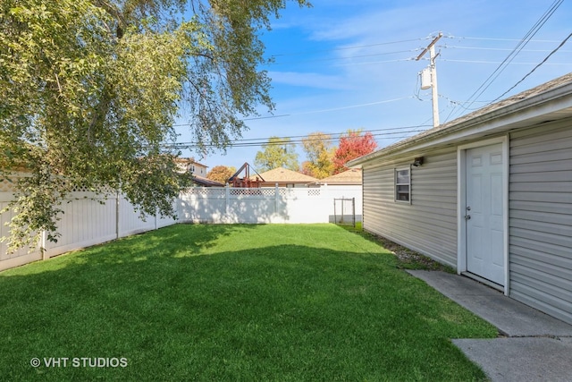 view of yard featuring a fenced backyard