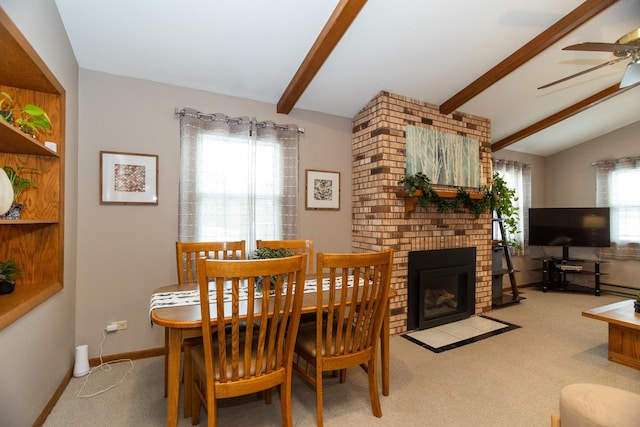4128 N Plainfield Ave, Chicago, IL 60634 - dining area with ceiling fan, a fireplace, carpet, baseboard heating, and baseboards