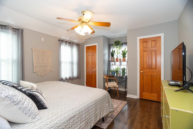 4128 N Plainfield Ave, Chicago, IL 60634 - bedroom with dark wood finished floors, baseboards, and ceiling fan