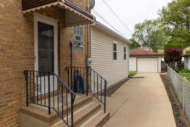 4128 N Plainfield Ave, Chicago, IL 60634 - wooden deck with a garage and an outbuilding