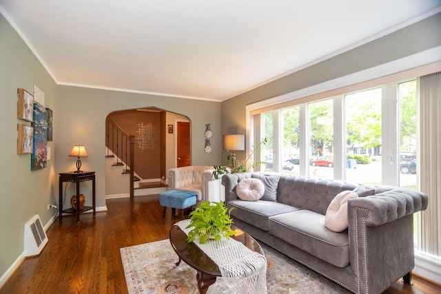 4128 N Plainfield Ave, Chicago, IL 60634 - living area featuring arched walkways, wood finished floors, baseboards, stairs, and ornamental molding