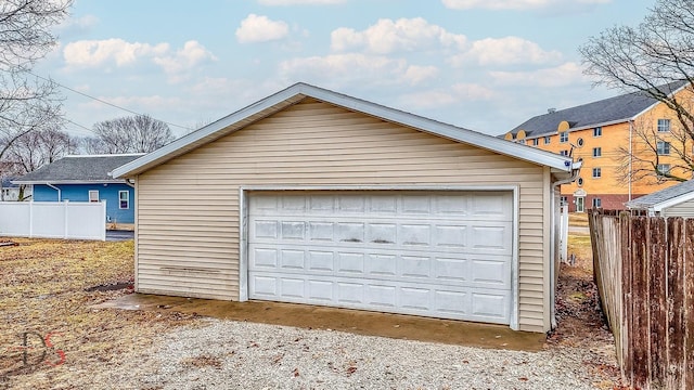 detached garage with fence