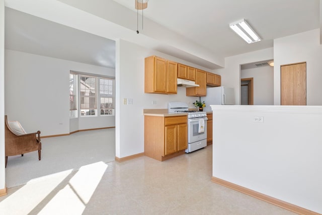 kitchen with visible vents, baseboards, under cabinet range hood, light countertops, and white appliances