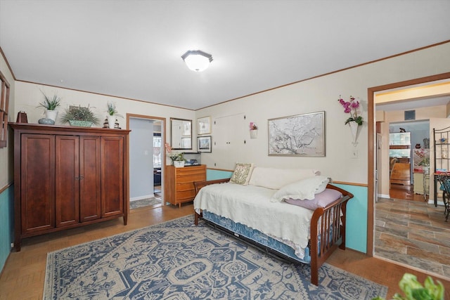 bedroom featuring crown molding