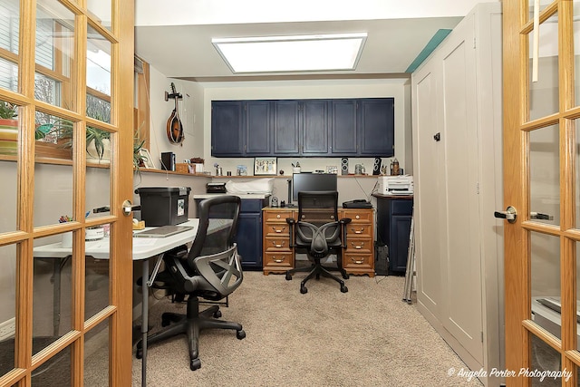 home office with light colored carpet