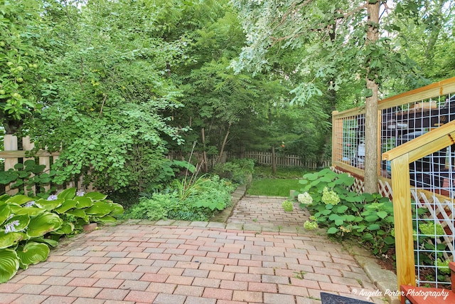 view of patio / terrace featuring fence