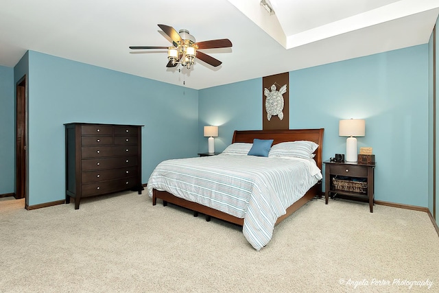 bedroom featuring carpet flooring, a ceiling fan, and baseboards