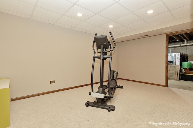 workout area with a paneled ceiling, visible vents, baseboards, and recessed lighting