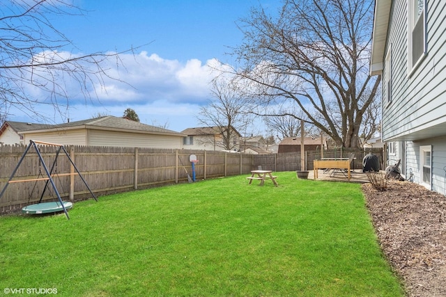 view of yard featuring a patio area and a fenced backyard