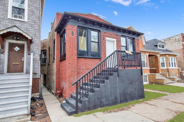 view of front of house with brick siding