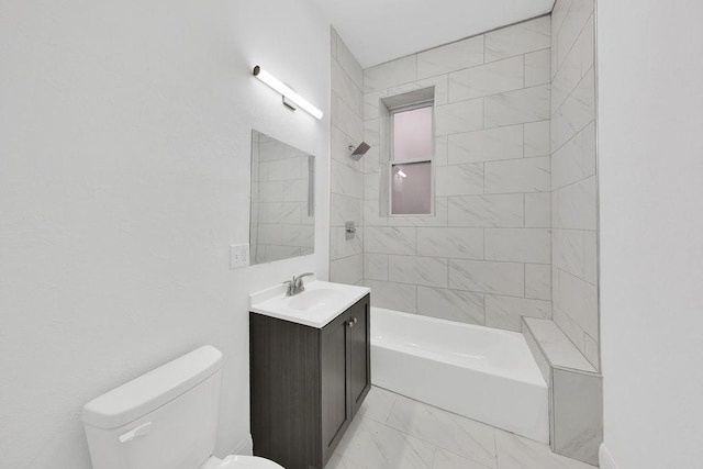 full bathroom with marble finish floor, shower / bath combination, vanity, and toilet