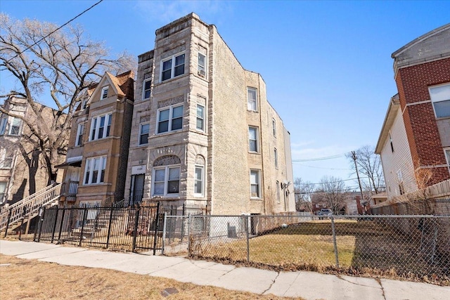 view of property with a fenced front yard