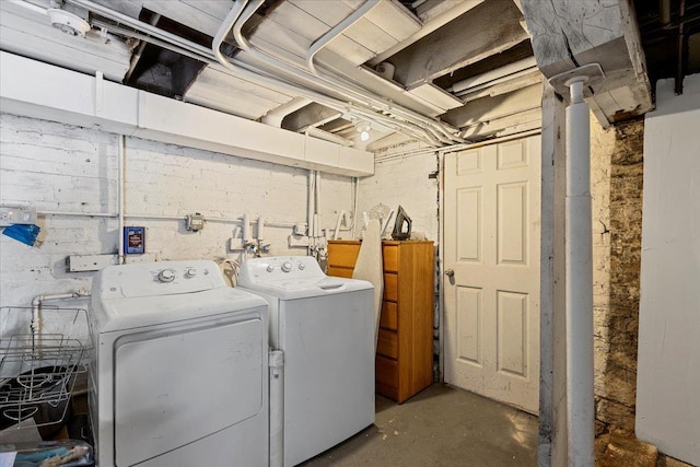 laundry room with washer and dryer and laundry area