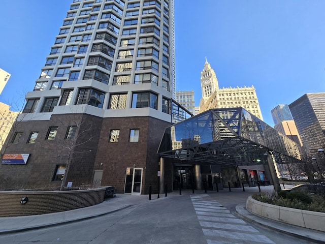 view of building exterior featuring a city view