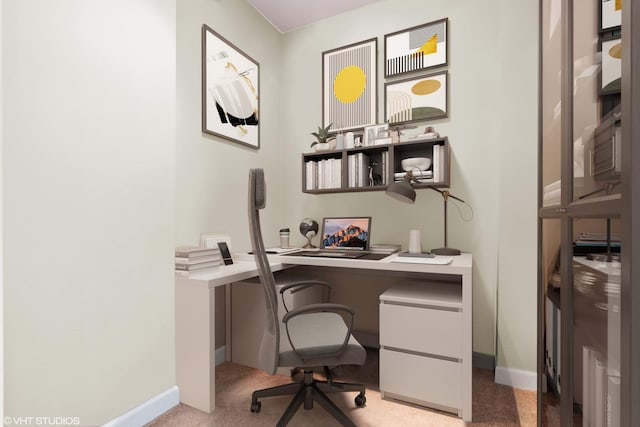 office featuring carpet floors and baseboards