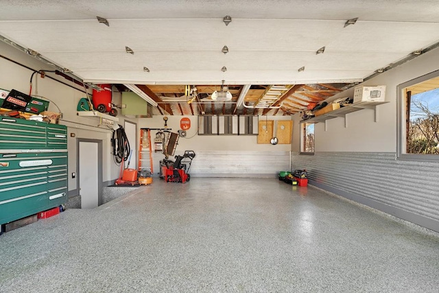 garage with a wainscoted wall