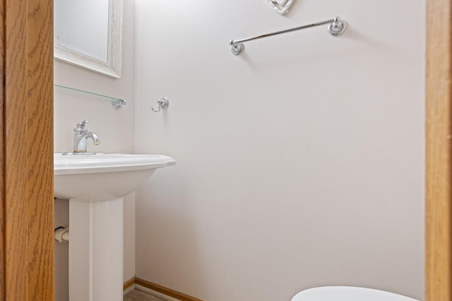 bathroom featuring baseboards