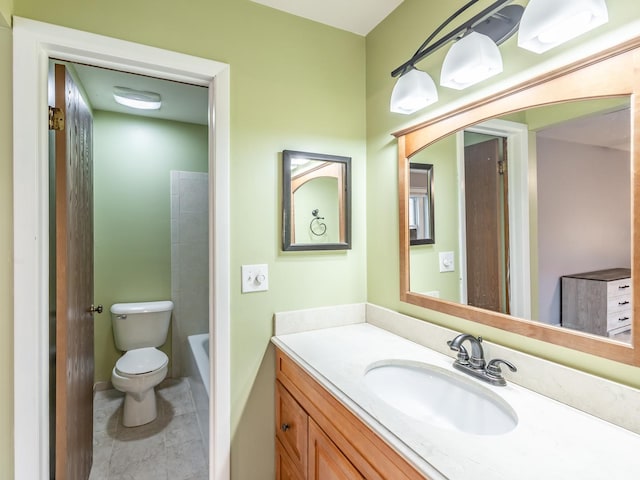 bathroom featuring toilet, vanity, a shower, tile patterned floors, and a tub