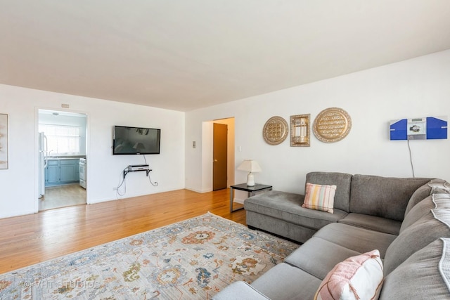 living area with wood finished floors